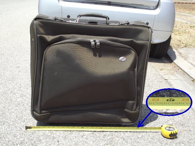 24 inch x 24 inch rolling suitcase