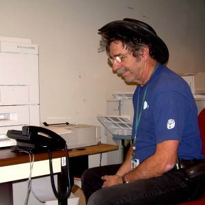 on speakerphone, in queue