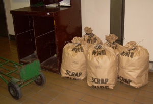 Scrap Wire, bagged, being sent company mail to be recycled